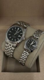 Çelik Takvimli Çift Saati